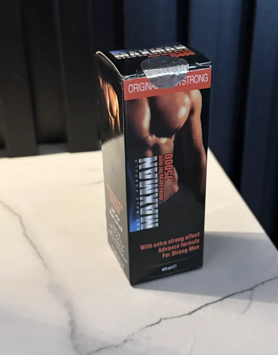 Caja original de Maxman 75000 Extra Strong sobre superficie de mármol